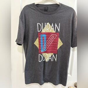 Unisex Duran Duran Graphic Tee with Red, Blue & Gold Print
Never worn